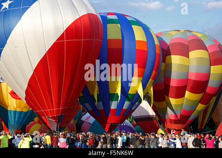 Colorful hot air balloons and crowd, Albuquerque International Balloon Fiesta, Albuquerque, New Mexico USA Stock Photo