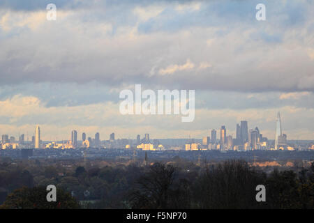 Epsom Downs, Surrey. 7th November 2015. After a day of wind and rain the storm finally passed just before dusk, with the sun casting a warm glow over the city of London, as viewed from Epsom Downs. Credit:  Julia Gavin UK/Alamy Live News Stock Photo