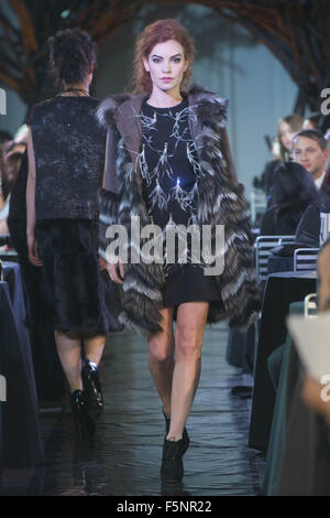 Calgary, Alberta, Canada. 7th Nov, 2015. A female model walks the Catwalk at HOLT RENFREW's Fashion Gala in Calgary features a dress from LANVIN & a jacket exclusively by HOLT RENFREW. Credit:  Baden Roth/ZUMA Wire/Alamy Live News Stock Photo