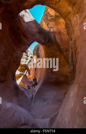 Happy Smiling Woman Hiker Inside Peekaboo Slot Canyon Utah USA Stock Photo