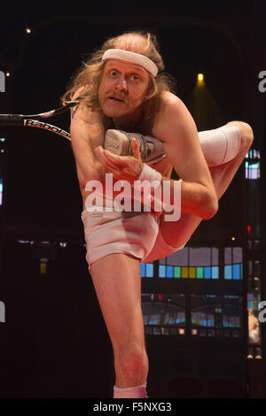 Captain Frodo, contortion with a tennis raquet. The Olivier Award winning show La Soiree returns to the La Soiree Spiegeltent at Southbank Centre for a sixth season from 27 October 2015 to 17 January 2016. Stock Photo