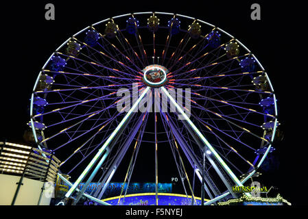 LEIPZIG, GERMANY-DECEMBER 21, 2014: Ferris wheel in center of Leipzig installed on Christmas market Stock Photo