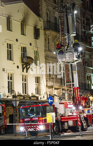 At least seven fire trucks and one Mobile Command Unit attend a fire at the Lyceum Tavern on the Strand  Featuring: View Where: London, United Kingdom When: 06 Sep 2015 Stock Photo
