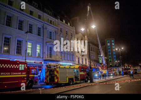 At least seven fire trucks and one Mobile Command Unit attend a fire at the Lyceum Tavern on the Strand  Featuring: View Where: London, United Kingdom When: 06 Sep 2015 Stock Photo