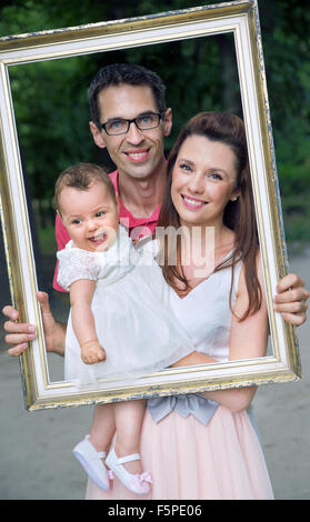 Portrait of the young and happy family Stock Photo