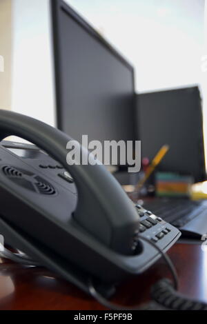 Office desk with computer and other items in the day Stock Photo