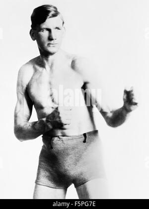 Vintage photo of Irish-American boxer Edward 'Gunboat' Smith (1887 - 1974). Smith, from Philadelphia, Pennsylvania, won the Heavyweight Championship of the Pacific Fleet while serving in the US Navy and after turning professional was regarded for a time as a leading 'White Hope' to regain the World Heavyweight Championship. He fought some of the leading boxers of his era including future champions Jess Willard and Jack Dempsey and after retiring became a referee and a movie actor. Stock Photo