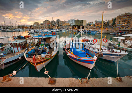 Old harbour with fishing boats and marina in Heraklion, Crete, Greece Stock Photo
