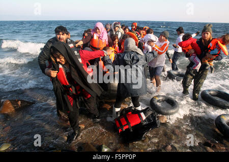 Lesbos Island, Greece. 8th Nov, 2015. Refugees land at Lesbos island, close to Eftalou, after crossing the Aegean Sea, Greece, Nov. 8, 2015. Credit:  Marios Lolos/Xinhua/Alamy Live News Stock Photo