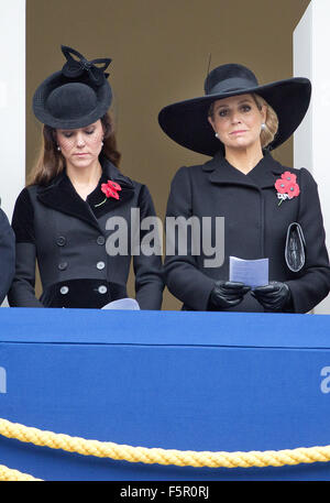 London, Britain. 08th Nov, 2015. Britain's Catherine, Duchess of Cambridge (L), stands alongside Queen Maxima of the Netherlands during a ceremony of Remembrance Day at the Cenotaph in London, Britain, 08 November 2015. Britain observed the annual Remembrance Day on 08 November, in memory of the war dead. Photo: Albert Nieboer/dpa/Alamy Live News Stock Photo