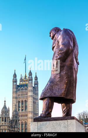 Statue of Sir Winston Churchill, looking towards Westminster Palace, Houses of Parliament, Elizabeth Tower, Big Ben, at Sunrise Stock Photo