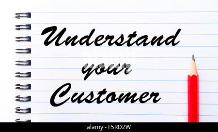 Understand Your Customer written on notebook page, red pencil on the right. Motivational Concept image Stock Photo