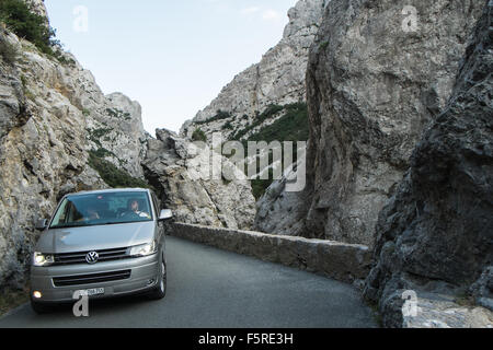 car,on,a,winding,windy,road,Narrow road south of Quillan in Aude,Galamus,Gorge,Gorges de,limestone,cliffs,South,of,France, Stock Photo