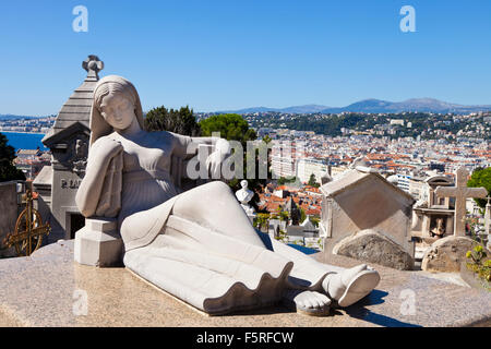 Staue of a recling woman in the graveyard at Cimetière du Château, Nice Fance Stock Photo