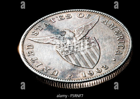 1908 Philippine silver1 peso coin from the American colonial era in studio setting Stock Photo