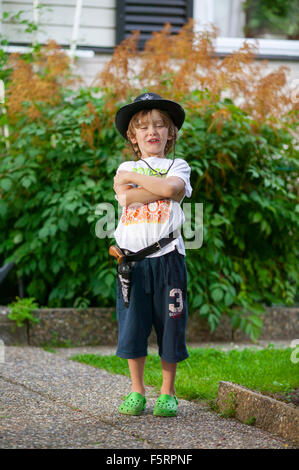 Sweden, Vastergotland, Lerum, Portrait of boy (8-9) in cowboy costume