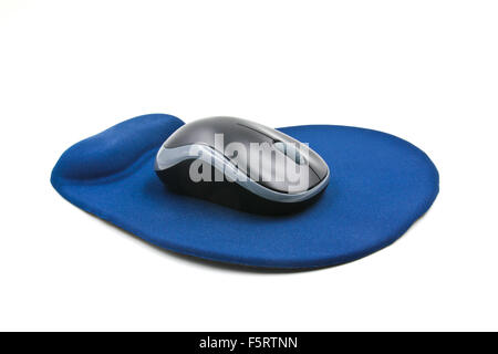 Wireless computer mouse on blue mouse pad isolated on white background Stock Photo
