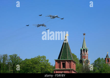4 Russian MiG-29 fighter jets, an Ilyushin Il-78 refueling tanker and a Tupolev Tu-95 turboprop long range bomber Stock Photo