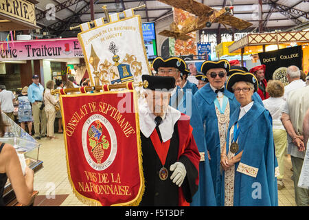 At parade of wine merchants organization of the wine producing regions in centre of Narbonne,Languedoc,Aude,South,France. Stock Photo