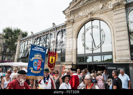 At parade of wine merchants organization of the wine producing regions in centre of Narbonne,Languedoc,Aude,South,France. Stock Photo