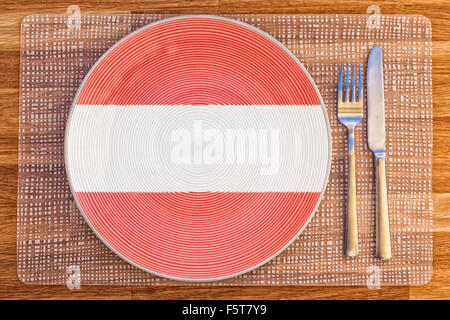 Dinner plate with the flag of Austria on it for your international food and drink concepts. Stock Photo