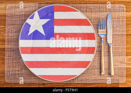 Dinner plate with the flag of Liberia on it for your international food and drink concepts. Stock Photo