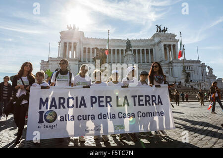 Rome, Italy. 08th Nov, 2015. Hundreds of people take part in a 'March for the Earth' to show support for Pope Francis' call for climate action in Rome. International organizations, civil society, associations, communities, and citizens from all over the world march together in support of Pope Francis' message in defense of the weakest and 'for the care for our common home' leading up to the UN Climate Conference (COP21) in Paris. Credit:  Giuseppe Ciccia/Pacific Press/Alamy Live News Stock Photo