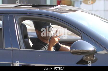 Criminal Minds star, Shemar Moore makes a hand gesture while driving his Porsche car in Beverly Hills  Featuring: Shemar Moore Where: Los Angeles, California, United States When: 08 Sep 2015 Stock Photo