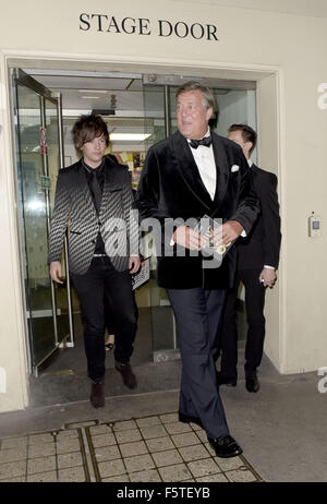 Stephen Fry and partner leaving via stage door  Featuring: Stephen Fry Where: London, United Kingdom When: 08 Sep 2015 Stock Photo