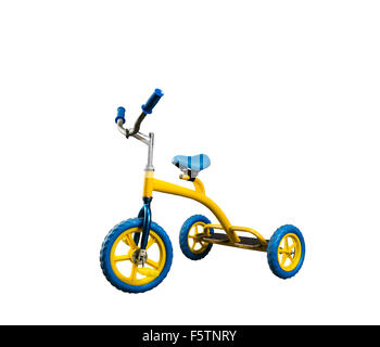 Vintage yellow kid's bicycle isolated on white Stock Photo