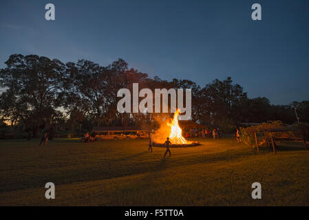 Fall get together and celebration with food, music, fun and games, and of course a huge bonfire in rural North Florida. Stock Photo