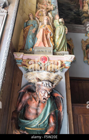 Devil in Church of Saint Mary Magdalene Rennes le Chateau,hilltop village associated with many conspiracy theories,Aude,France. Stock Photo