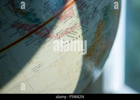 globe sunlight illuminating Indonesia Stock Photo