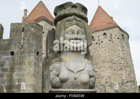 Modern statue,Dame Carcas,Porte Narbonnaise or Narbonne Gate entry to La Cité, Carcassonne Castle,Fort,Aude,France Stock Photo