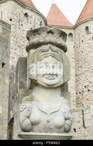 Modern statue,Dame Carcas,Porte Narbonnaise or Narbonne Gate entry to La Cité, Carcassonne Castle,Fort,Aude,France Stock Photo