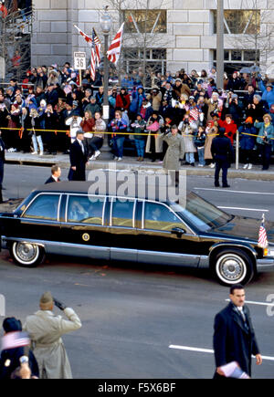 Washington, DC.USA. 20th January 1997 President William Jefferson Clinton waves from inside the 'Beast' limousine as his inaugural parade passes 14th street freedom plaza.  Credit: Mark Reinstein Stock Photo