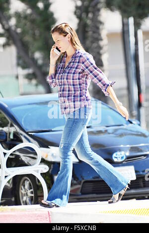 Jennifer Garner running errands wearing a blue denim 