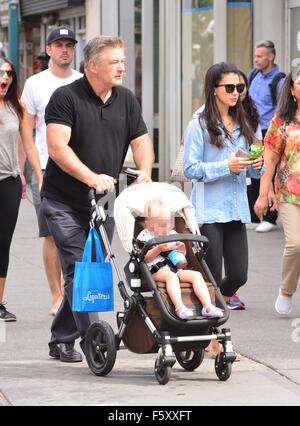 Alec Baldwin and wife Hilaria Baldwin take their daughter, Carmen, out for a stroll in SoHo  Featuring: Alec Baldwin, Hilaria Baldwin, Carmen Gabriela Baldwin Where: New York City, New York, United States When: 20 Sep 2015 Stock Photo