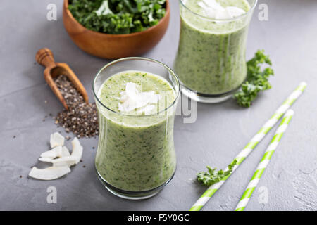 Green smoothie with banana, chia seeds and fresh kale Stock Photo