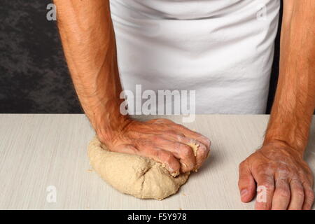 Kneading Dough. Making Flatbread. Stock Photo
