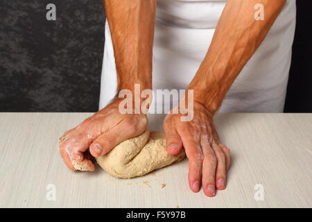 Kneading Dough. Making Flatbread. Stock Photo