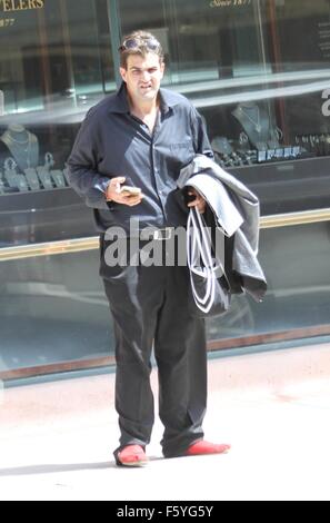 Jason Davis goes shopping in Beverly Hills in ill fitting trousers and red shoes  Featuring: Jason Davis Where: Los Angeles, California, United States When: 21 Sep 2015 Stock Photo