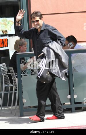 Jason Davis goes shopping in Beverly Hills in ill fitting trousers and red shoes  Featuring: Jason Davis Where: Los Angeles, California, United States When: 21 Sep 2015 Stock Photo