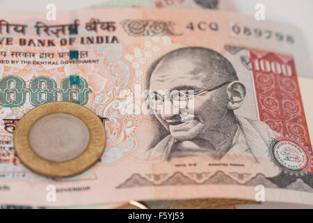 Indian Currency Rupee Notes and Coin Stock Photo