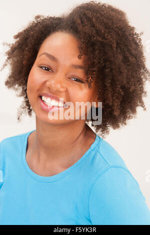Beautiful young woman smiling for the camera Stock Photo