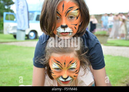 Playgrounds,kids, face painting, estates, day's out, play, kids care, schools, kids environments, children, community, parks Stock Photo