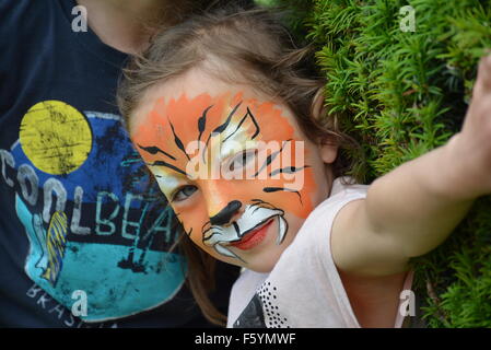 Playgrounds,kids, face painting, estates, day's out, play, kids care, schools, kids environments, children, community, charity, Stock Photo