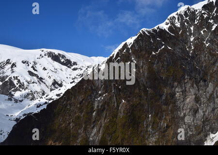 Snow capped Remarkables mountain range near Queenstown in the beautiful South Island of New Zealand. Stock Photo