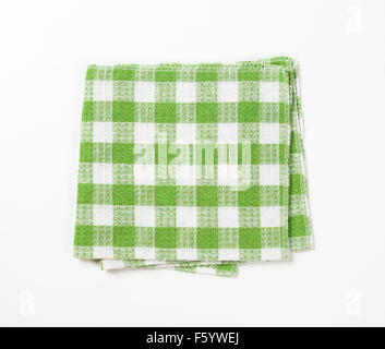 green and white checkered dishtowel on white background Stock Photo