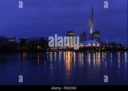 night shot of Esplanade Riel pedestrian bridge on the Red river between St-Boniface and Winnipeg, Manitoba Stock Photo